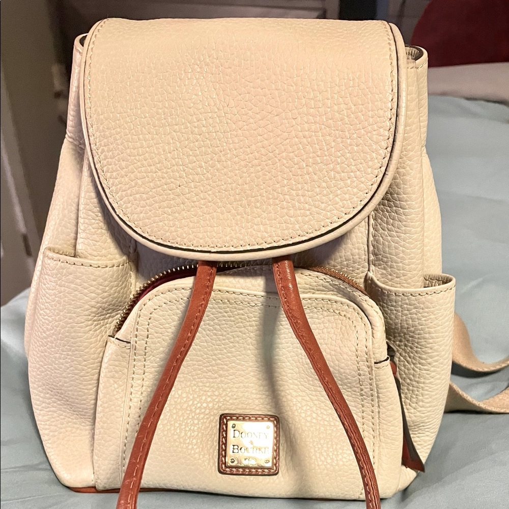 Dooney and Bourke cream Backpack in perfect condition.